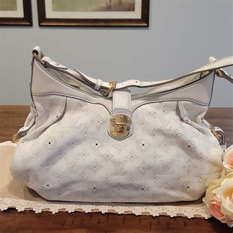 cream colored louis vuitton bag|louis vuitton mahina hobo bag.